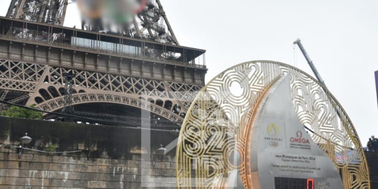 Paris et ses arènes accueillent le monde sous la pluie pour la première journée des Jeux Olympiques